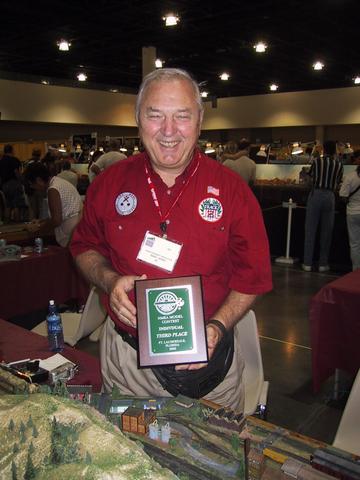 David George poses proudly with his 3rd Place - Module Individual Prize