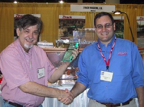 Reynard Wellman of Micron Art collects his second straight 'Z Best New Product Award'