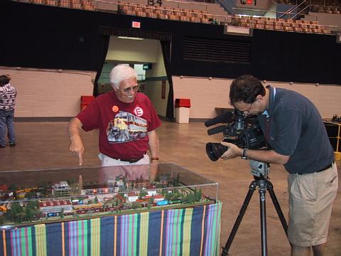 Terry Sutfin explains the workings of his PVDC to the TV4 cameraman.